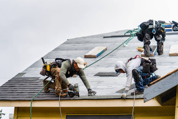 Professional Storm Damage Roof Repair technician working in Modesto, CA